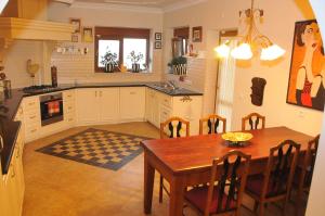 a kitchen with a table and a dining room at ALANYA KONAKLİ APART in Alanya +274 photos