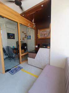 a view of a room with a counter and a window at Rukkmannie Holiday Inn in Ujjain +105 photos