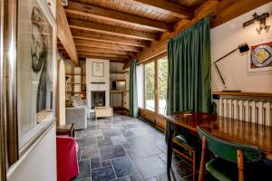 a living room with a table and a couch at Luxury Castle View in Sirmione