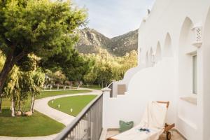 a view from the balcony of a house at Falkensteiner Resort Capo Boi in Villasimius