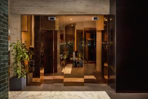 an entrance to a building with a glass door at Hotel Hendricks in New York