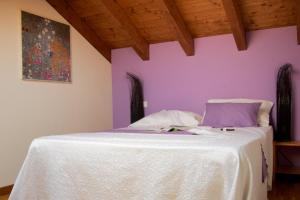 Postel nebo postele na pokoji v ubytování Cascina delle Mele