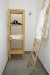a ladder next to a bunk bed in a room at Signature Suites Sauerland in Winterberg +80 photos