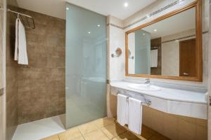 a bathroom with a sink and a shower at Hotel IPV Palace & Spa - Adults Recommended in Fuengirola