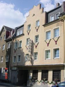 a building on the side of a street at Hotel Schmidt in Selb