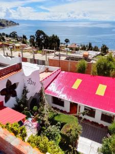 an overhead view of a building with red roof at Jardín Andino Hostal in Copacabana