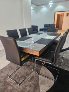 a conference room with a large table and chairs at Mimi in Dakar