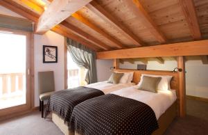 Katil atau katil-katil dalam bilik di Altitude Lodge