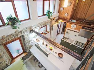 an overhead view of a kitchen in a tiny house at Holiday Home Caa de Sass by Interhome in Castelveccana