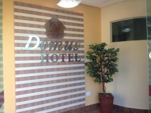 Certifikát, hodnocení, plakát nebo jiný dokument vystavený v ubytování Domus Hotel Trindade - Canaã dos Carajás