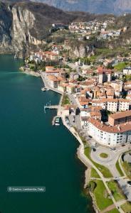 an aerial view of a town next to a body of water at Borgo&Lago Home in Castro