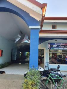 a bike parked in front of a building at Marina Loft unit 2 floor, 201 in Coco