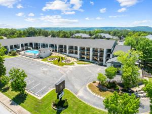 an aerial view of a large building with a parking lot at Branson Falls Lodge in Branson