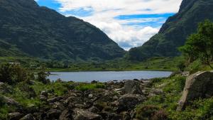 a view of a lake in a valley with mountains at Killarney Riverside Hotel in Killarney +11 photos