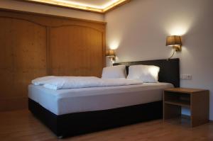 Posteľ alebo postele v izbe v ubytovaní Tennenwirt Guesthouse - Adults only