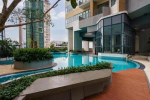 a swimming pool in the middle of a building at Trizen OceanView in Colombo