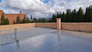 a large swimming pool on top of a house at Prestige Villa in Marrakesh