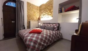 Un pat sau paturi într-o cameră la Casa Vincenti