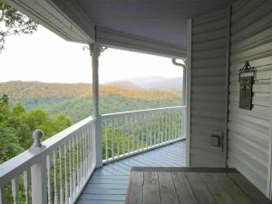 a porch of a house with a view of the mountains at Sky Harbour in Andrews