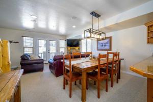 a kitchen and dining room with a table and chairs at Bigfoots Alpine Retreat MH710By Powder Mtn Hot Tub in Eden +48 photos