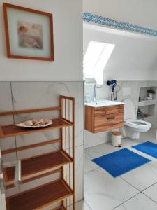 a bathroom with a sink and a toilet at Weserblick Hafen-Villa-Bremen in Bremen +136 photos