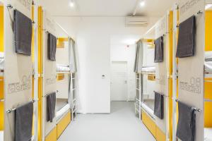 TV a/nebo společenská místnost v ubytování Flow Spaces