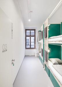 Postel nebo postele na pokoji v ubytování Flow Spaces + 37 fotografií