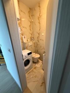 a dirty bathroom with a toilet and a sink at Sunset Bay Casa in Dolac +109 photos
