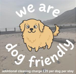 a dog on the beach with the words we are fire at Cromer Getaway luxury apartment in Cromer +17 photos