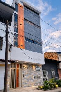 a building with a large window on the side of it at studio confort in Iquitos