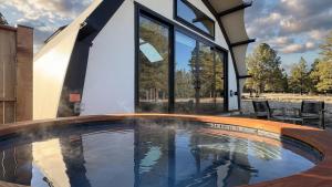 a swimming pool in a house at Backland Luxury Nature Resort in Williams