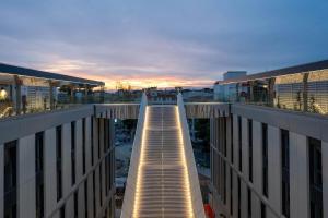 a view from the top of a building at sunset at The Social Hub Florence Belfiore in Florence