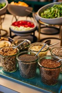 a tray of different types of food on a table at The Social Hub Florence Lavagnini in Florence