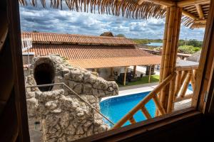 a view of a swimming pool from a house at Estados Unidos Experience in Ríohacha