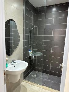 a bathroom with a sink and a mirror at Penthouse El Gouna, Hurghada in El Gouna +11 photos