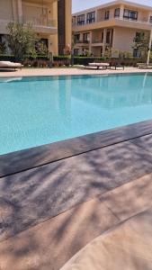 a large swimming pool in front of a building at Penthouse El Gouna, Hurghada in El Gouna