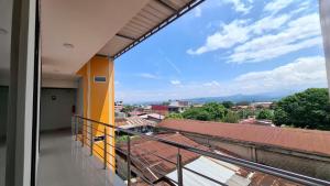 a balcony with a view of a city at Hospedaje Jasmine in Tarapoto