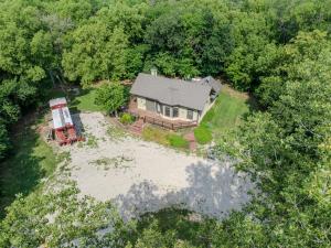 an aerial view of a house with a truck in the yard at The Train Station in Salina