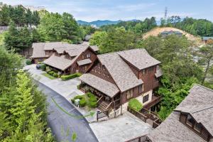 an overhead view of a large wooden house at 2mils Dollywood, Resort Pool, King Bed, SL6 in Pigeon Forge +31 photos