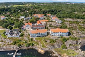 an aerial view of a home on a cliff at Ekenäs Havshotell Koster in Sydkoster