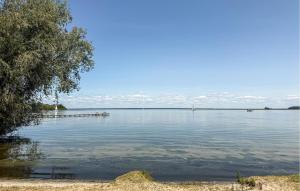 a view of a large body of water at Nice Home In Röbel With Sauna in Röbel +20 photos