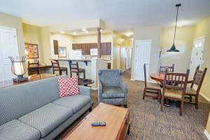 a living room with a couch and a table at WorldMark Bison Ranch in Overgaard