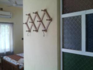 Postel nebo postele na pokoji v ubytování Adams Wood House Ayurveda Homestay Kochi