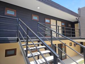 a staircase leading up to a house at Apartamentos TerraLoft in San Antonio