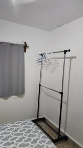 a glass shelf in the corner of a room at First Floor 2 Bed Apartment in La Ceiba