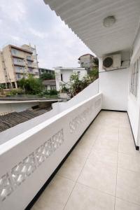 a balcony with white walls and a white railing at W Hotel Mount Lavinia - Colombo in Colombo
