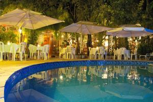 Swimming pool sa o malapit sa Pousada Casa das Flores
