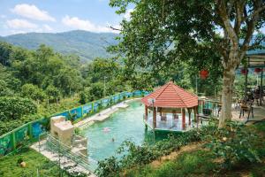 a water park with a gazebo in the water at Thành An Homestay in Hòa Bình +69 photos