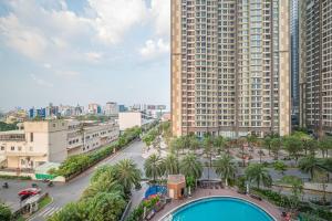 an overhead view of a city with a large building at Elysian Suites In Landmark Saigon by VNS in Ho Chi Minh City