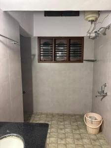 a bathroom with a sink and a toilet at Untitled Space Residency in Bangalore